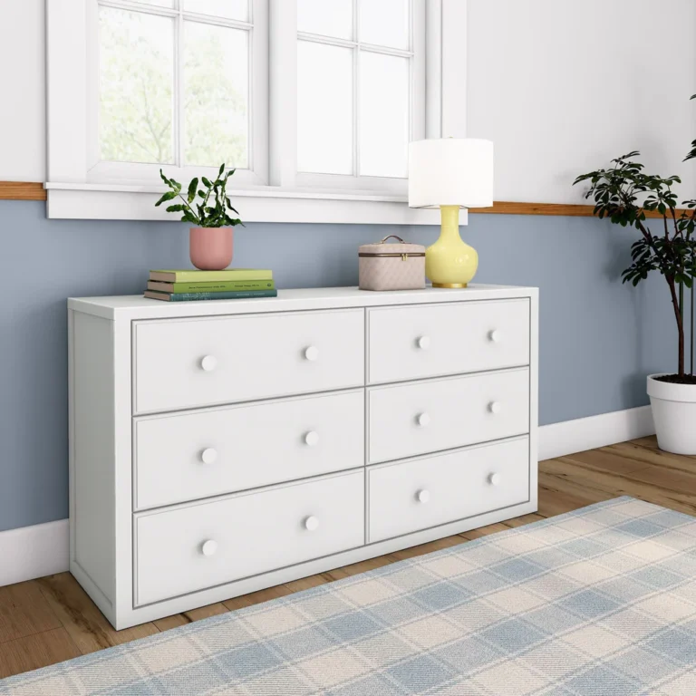 Maxtrix 6 Drawer Dresser White Angle View Room Scene Maxtrix 6 Drawer Dresser in White - side angle view in a bedroom beside a window and potted plant