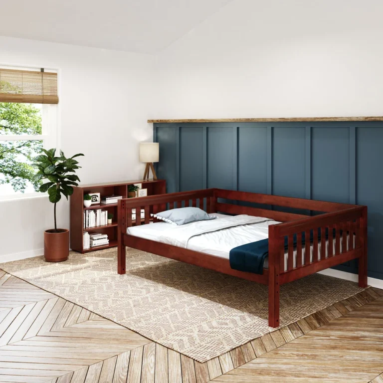 Maxtrix 6 Shelf Bookcase Chestnut Room Scene 2 Maxtrix 6 Shelf Bookcase in Chestnut - bedroom scene with the low bookcase filled with books beside a matching daybed and potted plant