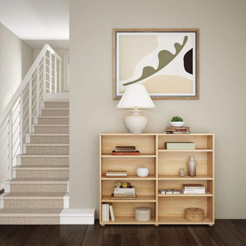 Maxtrix 8 Shelf Bookcase Natural Room Scene Maxtrix 8 Shelf Bookcase in Natural - styled with books and decor in a hallway beside a staircase