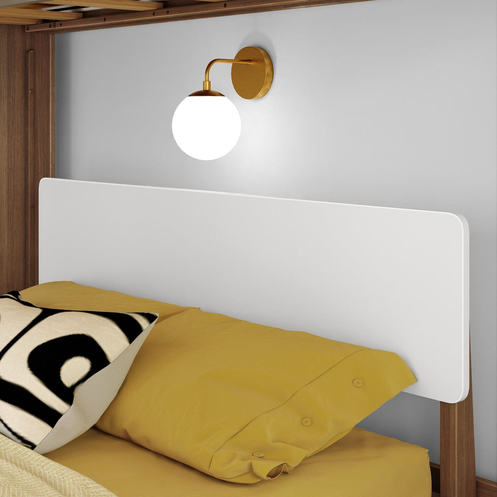 Mid-Century Modern Twin Over Full L-Shaped Bunk Bed in White/Pecan - closeup of the lower full bed's white headboard with pillows beneath the upper bunk frame