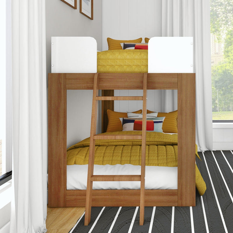 Mid-Century Modern Twin Over Twin Low Bunk Bed in White/Pecan - end view in a bright bedroom showing both bunks made up with the angled ladder leaning against the frame