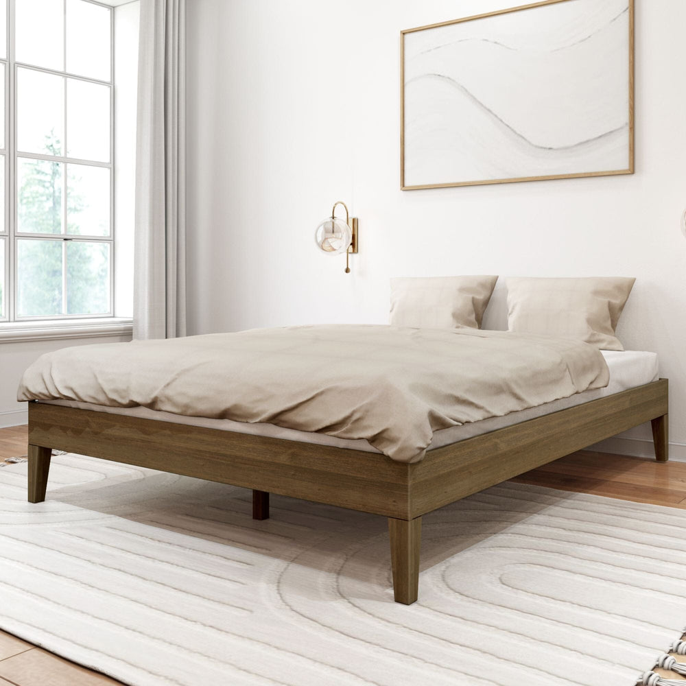 Queen Size Platform Bed in Walnut - angled view in a styled bedroom with beige bedding, a large window, and framed wall art