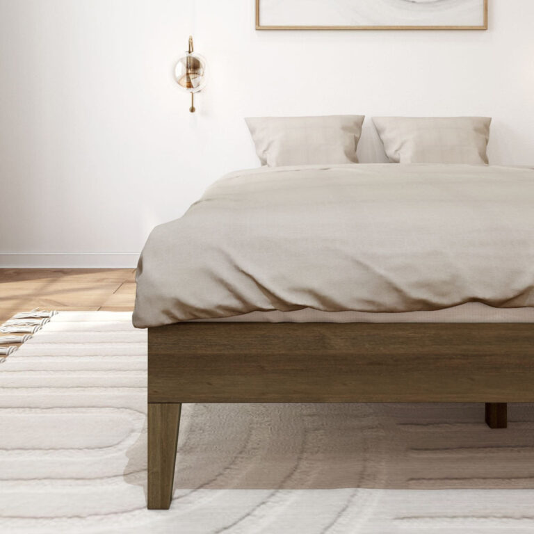 Queen Size Platform Bed Walnut Foot Detail Queen Size Platform Bed in Walnut - close-up of the foot corner showing the low-profile side rail and tapered leg with draped bedding